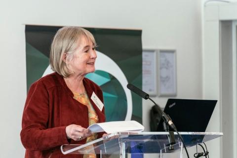 Dr Kate Richards speaking at a lectern
