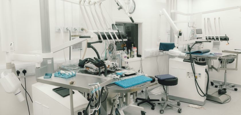 A well stocked veterinary practice room showing a range of medical equipment