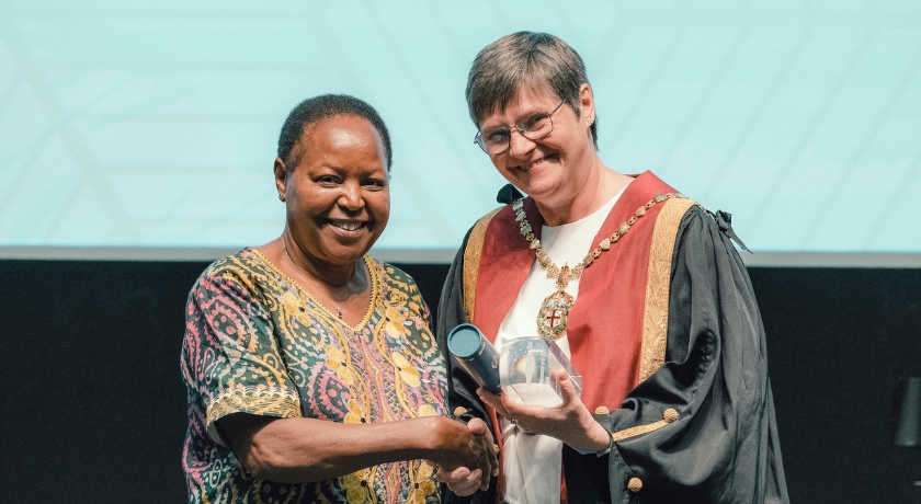 Sue Paterson presenting the International award to Professor Susan Mbuga