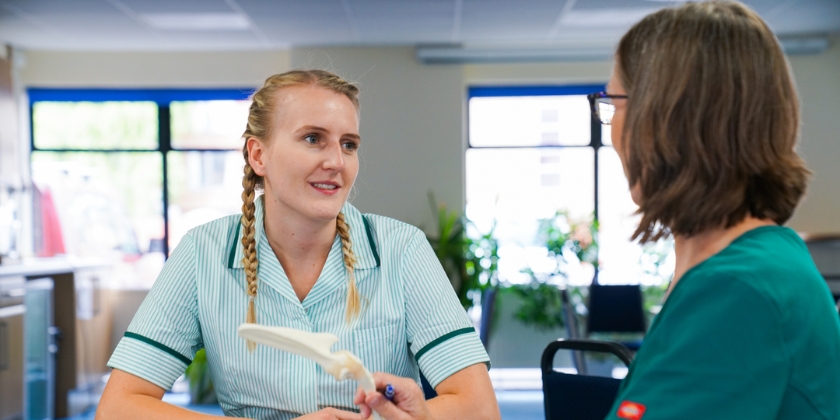 two nurses sat chatting