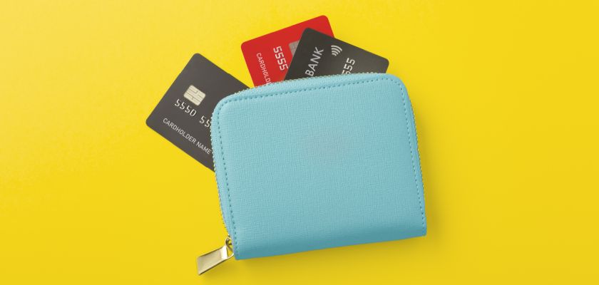 An open purse with credit cards