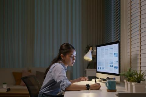 Girl sitting at a desk studying