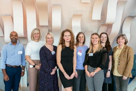 A group of MMI grant winners pictured smiling in a group photo at the 2023 Mind Matters Symposium